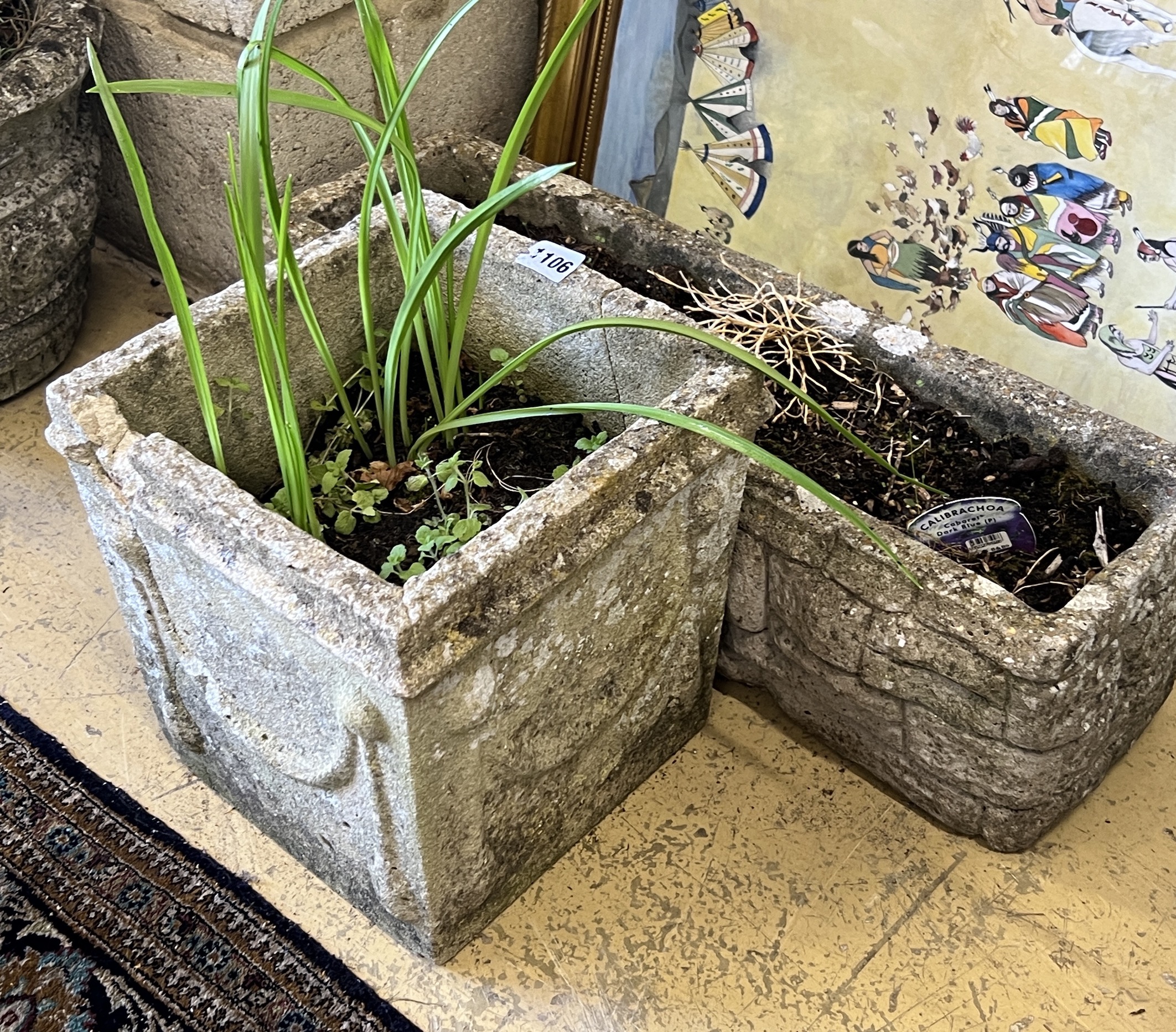 Two reconstituted stone garden planters, larger width 57cm